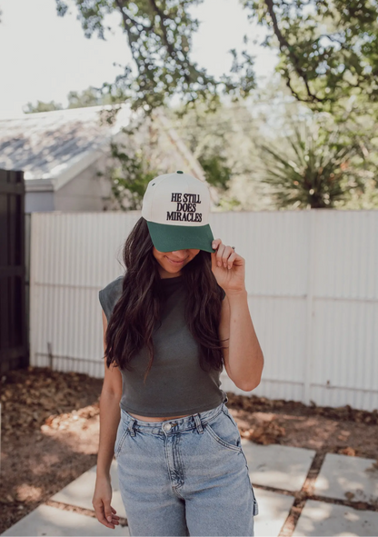 ‘HE STILL DOES MIRACLES’ Embroidered Trucker Hat