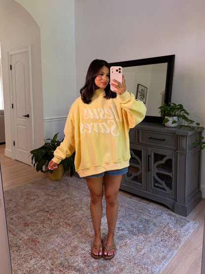 ‘Jesus Saves’ Puff Yellow Mockneck