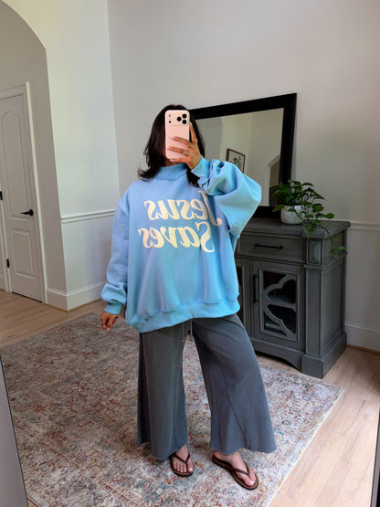 ‘Jesus Saves’ Puff Blue Mockneck