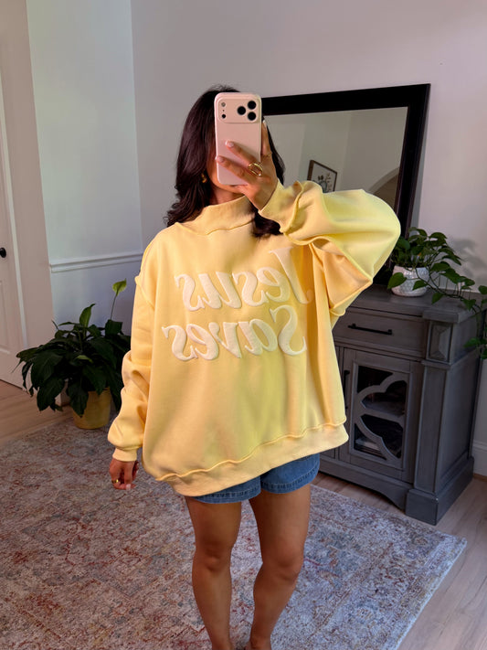 ‘Jesus Saves’ Puff Yellow Mockneck
