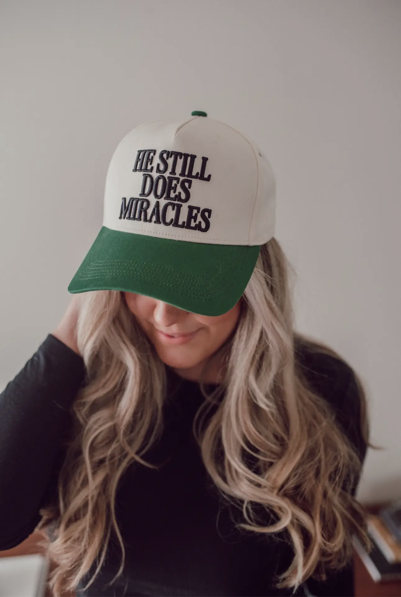 ‘HE STILL DOES MIRACLES’ Embroidered Trucker Hat